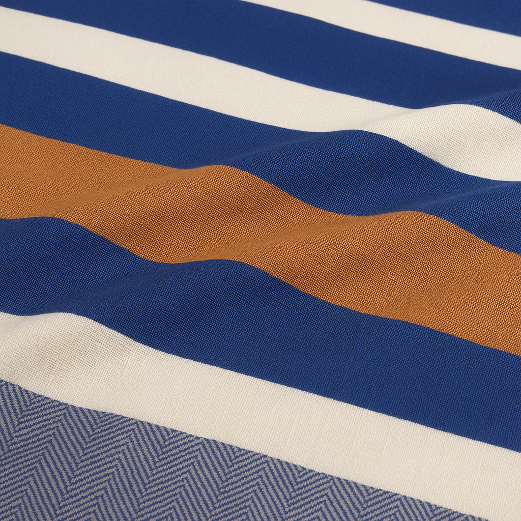 Close-up of fabric with blue, brown, and white stripes.